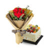 Fruits pudding cake with red roses bouquet